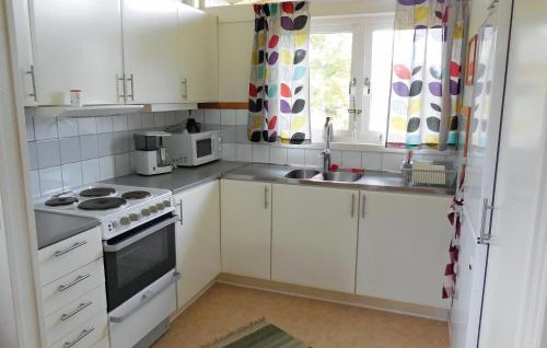 Kitchen, Holiday Home Garsnas Xciii in Skraddarod