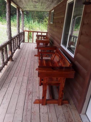 Amish made cedar cabin with a loft on a buffalo farm close to the Buffalo River