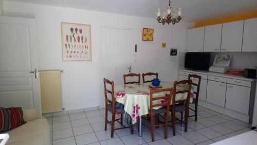 Appartement en rez de chaussee de maison