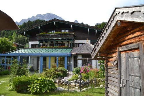 Bejárat, Pension Restaurant Dorfalm in Sonnrain