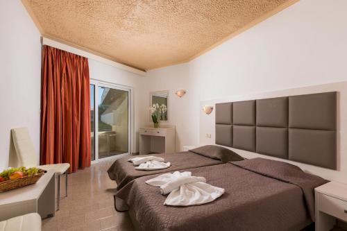 Relax Hotel Set in a prime location of Kolymbia, Relax Hotel puts everything the city has to offer just outside your doorstep. The hotel offers a wide range of amenities and perks to ensure you have a great time.