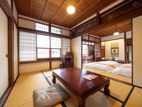 Japanese-Style Family Room with Shared Bathroom