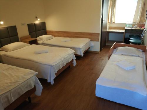 3 twin beds, 1 sofa bed