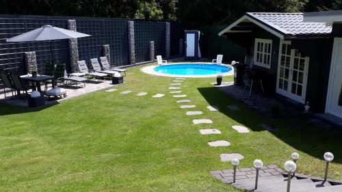 FeWo Meyer mit privatem Pool & Gartensauna