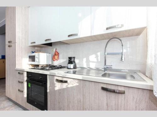 Two-Bedroom Apartment with Terrace room in Family-friendly apartments with swimming pool Rijeka - 14294