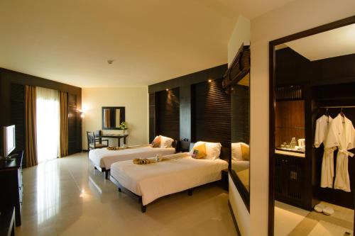 The Nouveau Chumphon Beach Resort And Golf - Tap to explore photos