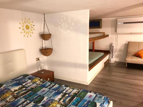 ALGHERO MONOLOCALE SOPPALCATO CON TUTTI I COMFORT gîte à louer Alghero