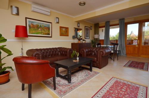 Darījumu centrs, Art Garni Hotel in Kaņiža