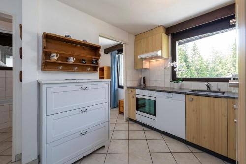 Apartment Tgesa La Roiva mit Hallenbad und Sauna