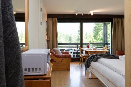 Apartment Tgesa La Roiva mit Hallenbad und Sauna