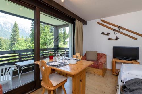 Apartment Tgesa La Roiva mit Hallenbad und Sauna