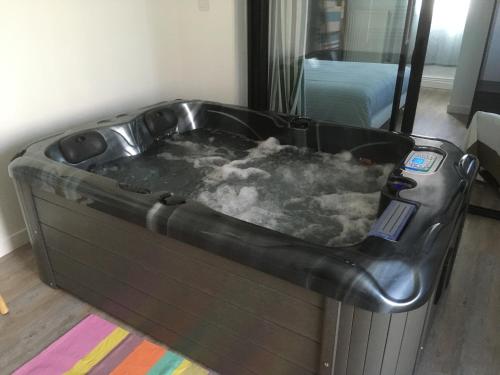 Gîte avec jacuzzi privatif à proximité de l'océan