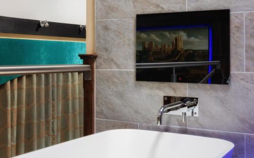 ห้องน้ำ, Rogerthorpe Manor Hotel in ทอร์ปออดลิน