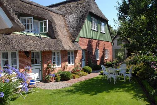 Reetdachhus an de Diek Reetdachhus an de Diek