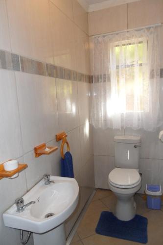 Badkamer, Rosy Palm Sunrise near Upington Airport