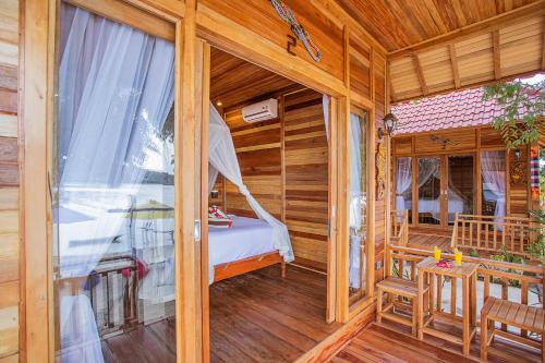 Balcony/terrace, Wooden Beach Sunset Cottages near Two Raksa Cafe
