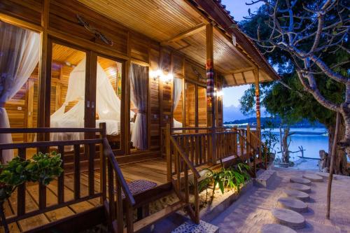 Exterior view, Wooden Beach Sunset Cottages near Two Raksa Cafe