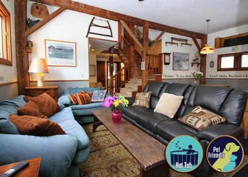 Rustically renovated Chestnut Farms is a 9 bedroom Vermont farmhouse, with outdoor hot tub