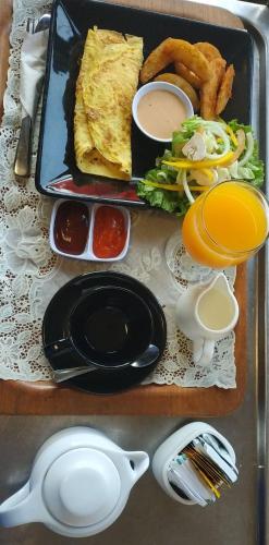 Foto - Roosseno Plaza Serviced Apartment