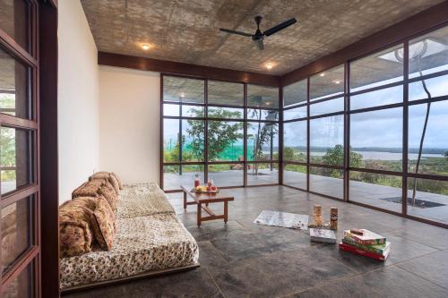 SaffronStays Zen, Igatpuri - lake-view villa with indoor and outdoor games