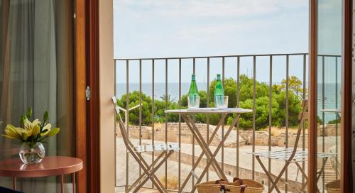 Deluxe Room with Partial Sea View and Spa Access