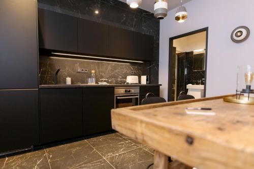 TG Hotel Suites Budapest - image 6