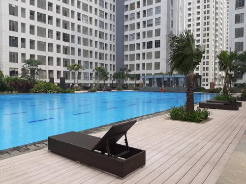 Comfortable 2BR Apartment Serpong M-Town Residence By Travelio - image 3