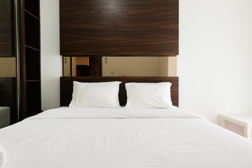 Fully Furnished 2BR Apartment at M-Town Residence By Travelio, Tangerang