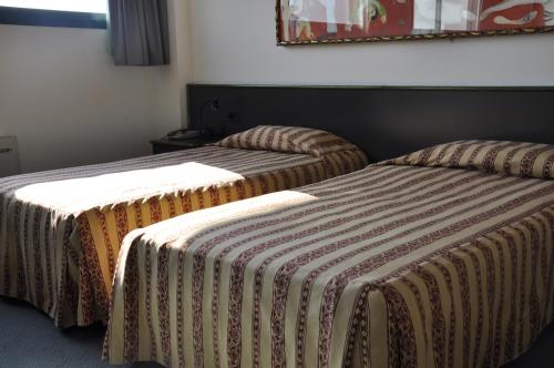 Green Hotel Room Type - Large Twin Room