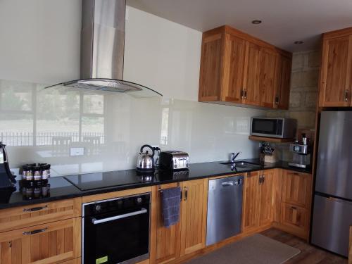 Kitchen, Mahana Farm Cottage in Nelson