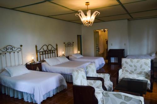 Quadruple Room room in Finca Hotel Los Girasoles