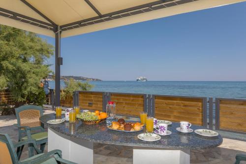 Venetico Beachfront Apartments & Suites - 2 Bedroom Apartment - Location saisonnière - Argassi