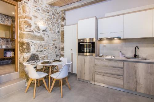 Kitchen, Stairs Homes & Suites in Anatoliko Selino