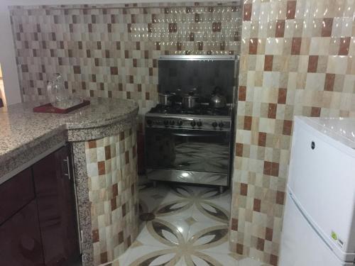 Kitchen, Naima appartment in Moulay Bousselham