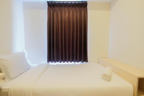 Spacious 2BR Apartment at The Springlake Summarecon Bekasi By Travelio - image 4
