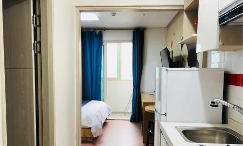 Hotel Joy near Camp Humphres Room Type - Deluxe Room
