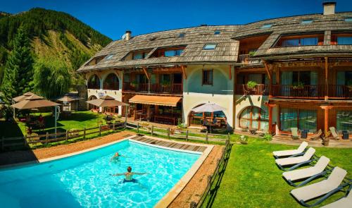 photo chambre Hôtel & Spa La Ferme de l'Izoard