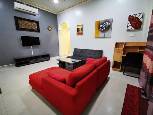 Shared lounge/TV area, Amera Homestay in Kampung Bukit Kuang
