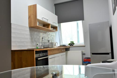 Apartamenty i pokoje „Pod Jedynką”