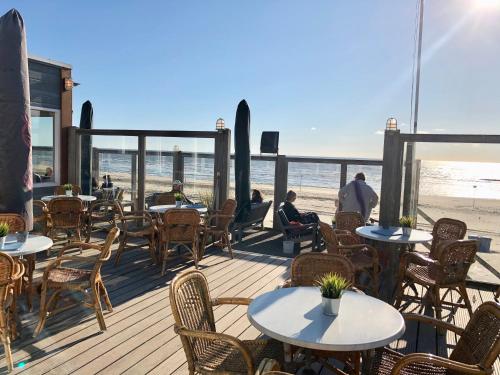 Étterem, Appartementen de Strandloper in Bergen aan Zee