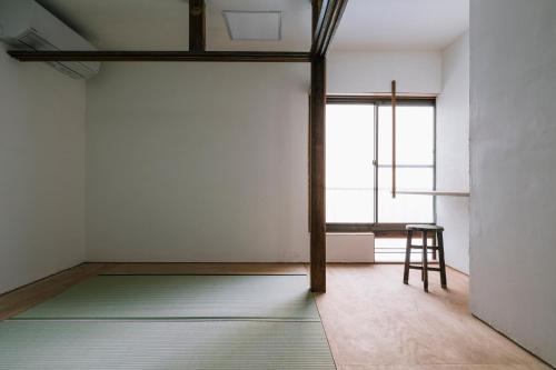 Standard Triple Room with Shared Bathroom