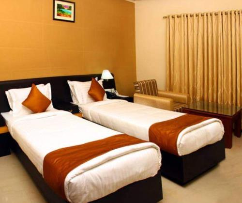 Hotel Emerald Regency in Changanassery
