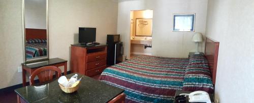 Atrium Inn & Suites