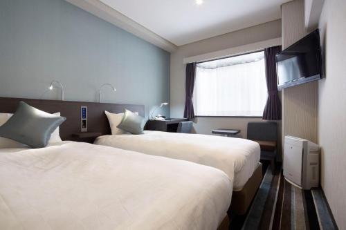 Twin Room with Lounge Access ＆ Complimentary Light Breakfast - Non-Smoking image 8