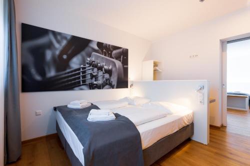 mk | hotel münchen max-weber-platz Room Type - Quadrupel Room