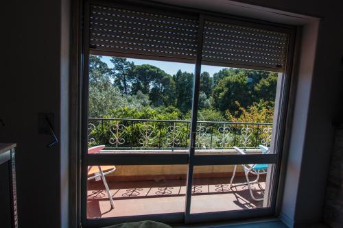 ระเบียง/ชานเรือน, Carvalhos House in เชา เด เมนิโนส