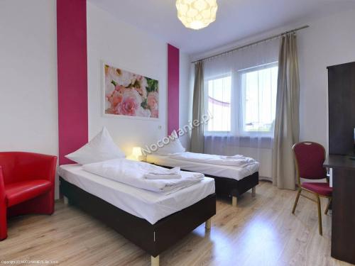 . Hotelik Kameleon Pokoje Gościnne