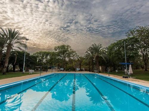 Swimming pool, Kalia Kibbutz Holiday Village in Dead Sea