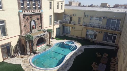 Hotel Khiva Palace - Tap to explore photos