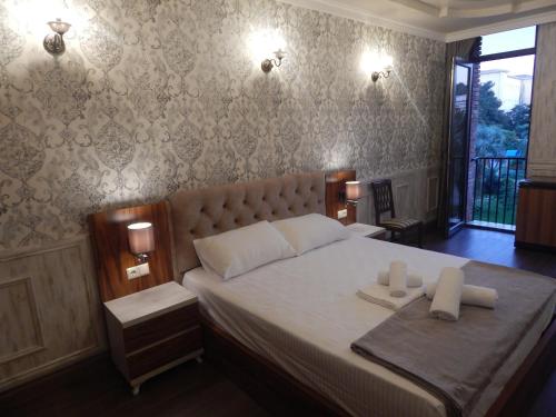 MELINI Boutique Hotel in בתומי